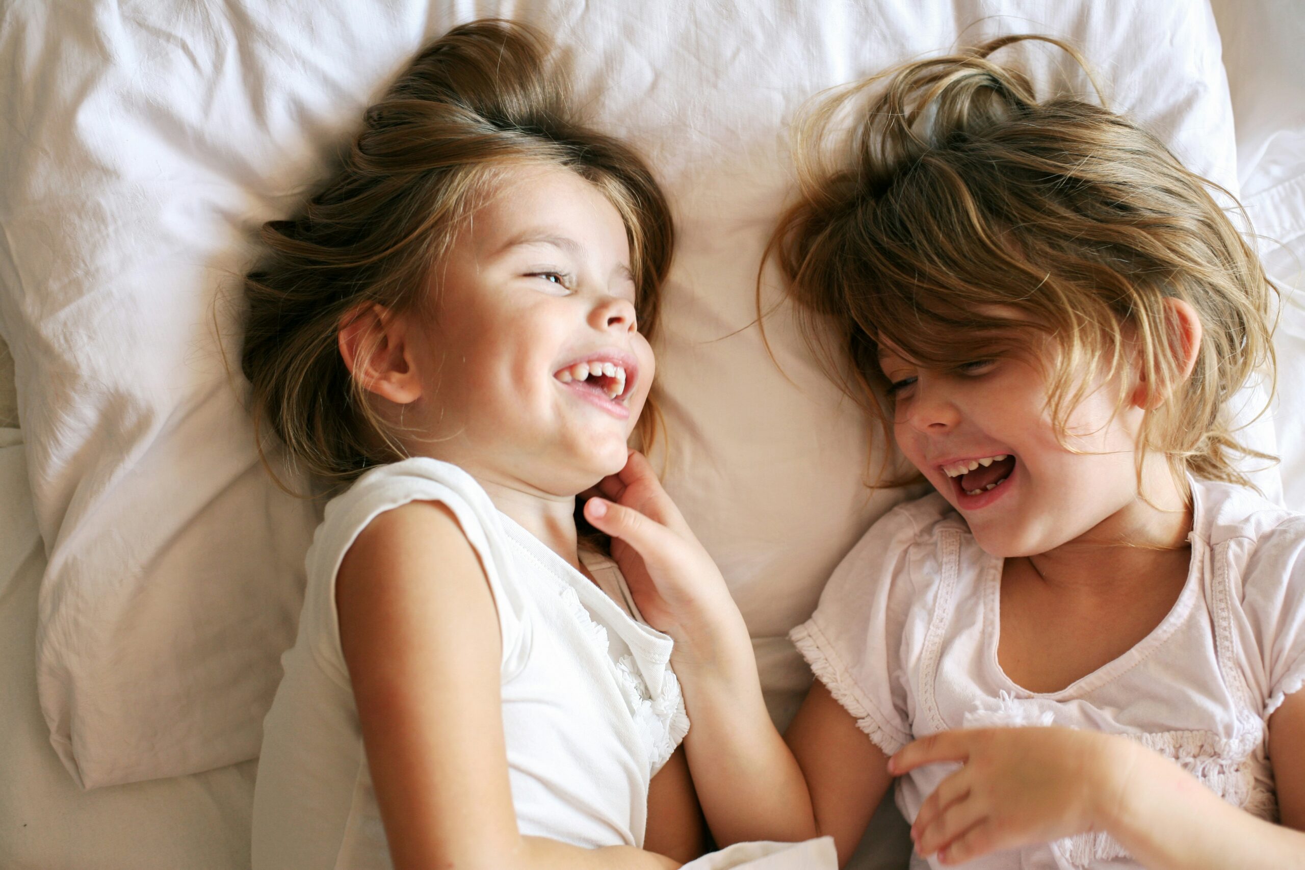 Two little girls laughing