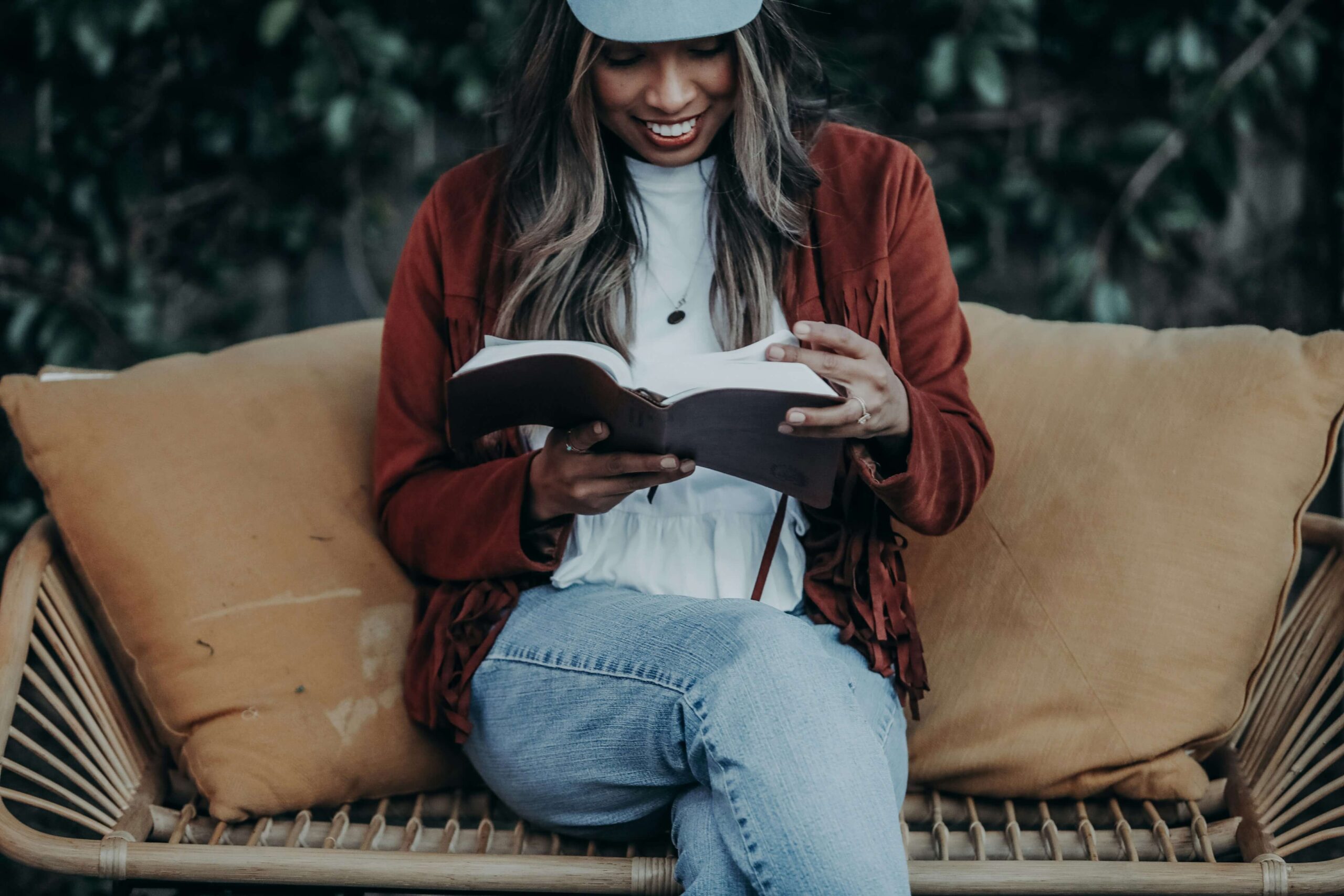 thriving young Christian woman full of hope and reading her Bible